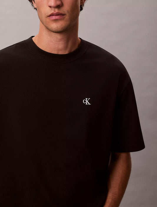 Calvin Klein Relaxed Monogram Logo Relaxed Crewneck T-Shirt in Black