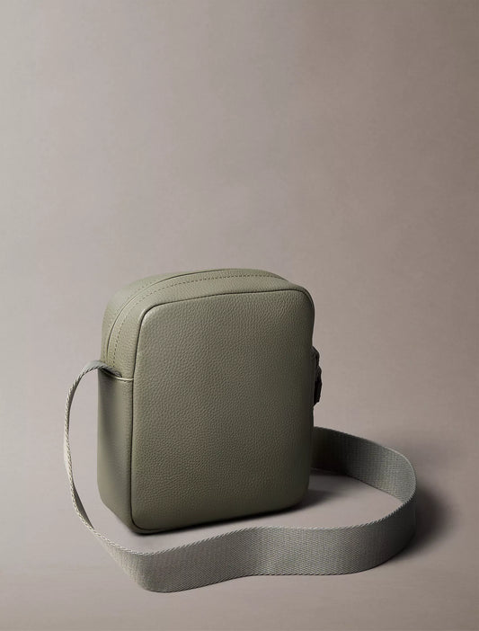 Calvin Klein Pebbled Reporter Bag in Deep Lichen Green
