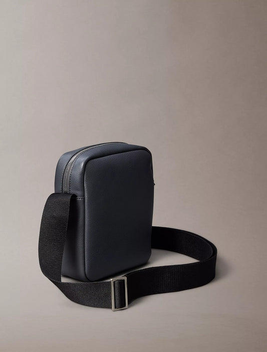 Calvin Klein Micro Pebble Reporter Bag in Iron Gate