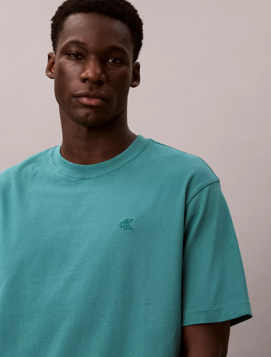Calvin Klein Monogram Logo Relaxed Crewneck T-Shirt in North Sea