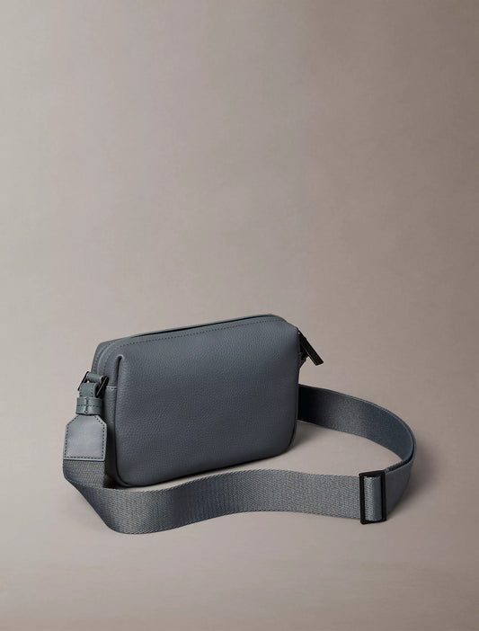 Calvin Klein Pebbled Camera Bag in Turbulence