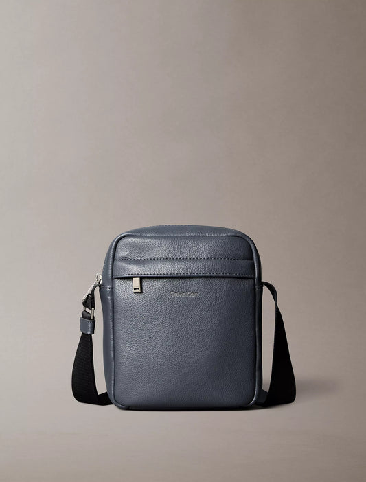 Calvin Klein Micro Pebble Reporter Bag in Iron Gate