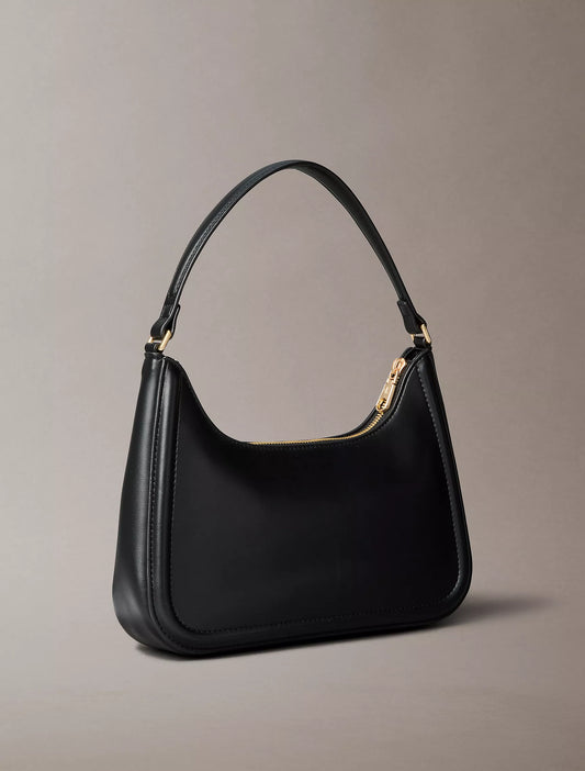 Calvin Klein Embossed Monogram Shoulder Bag in Black