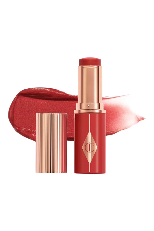 Charlotte Tilbury Unreal Lip + Cheek Glow Blush Stick with Hyaluronic Acid in Cherry Glow