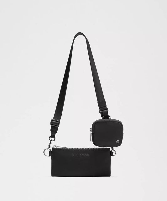 Lululemon Dual-Pouch Sling Bag in Color Black