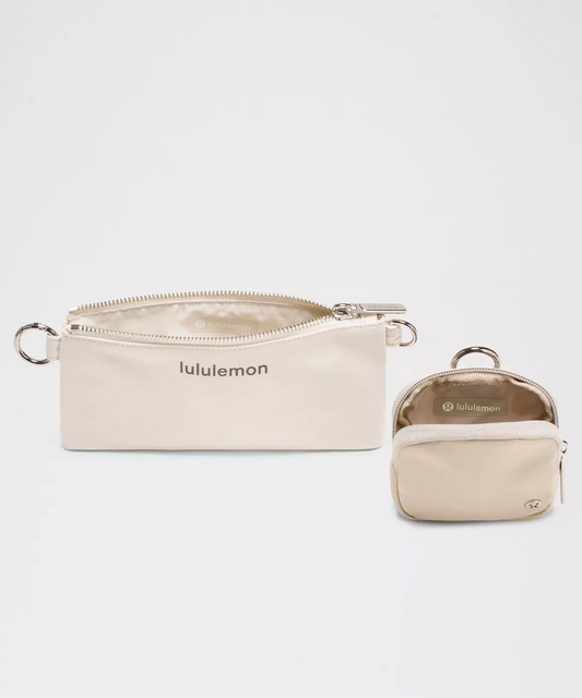 Lululemon Dual-Pouch Sling Bag in Color Raw Linen/Bone