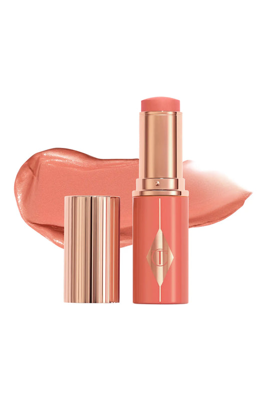 Charlotte Tilbury Unreal Lip + Cheek Glow Blush Stick with Hyaluronic Acid in Peachy Glow